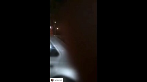 Iranian potesters are burning cars of police in the street