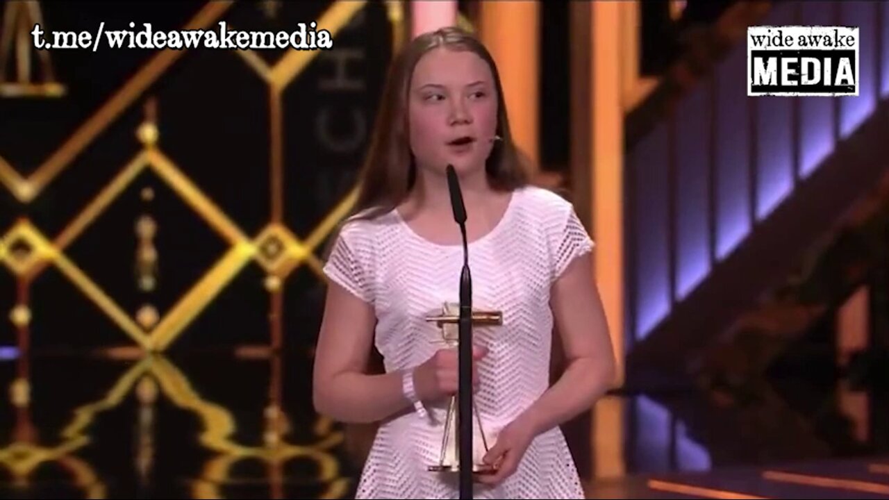 Climate doomsday cult masot, Greta Thunberg, reads a pre-written script