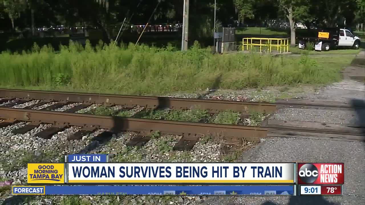 Tampa woman survives being hit by train after walking on tracks while wearing headphones