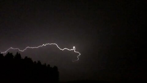 Aftermath of a thunderstorm, light rain and drips, distant rumbles of thunder