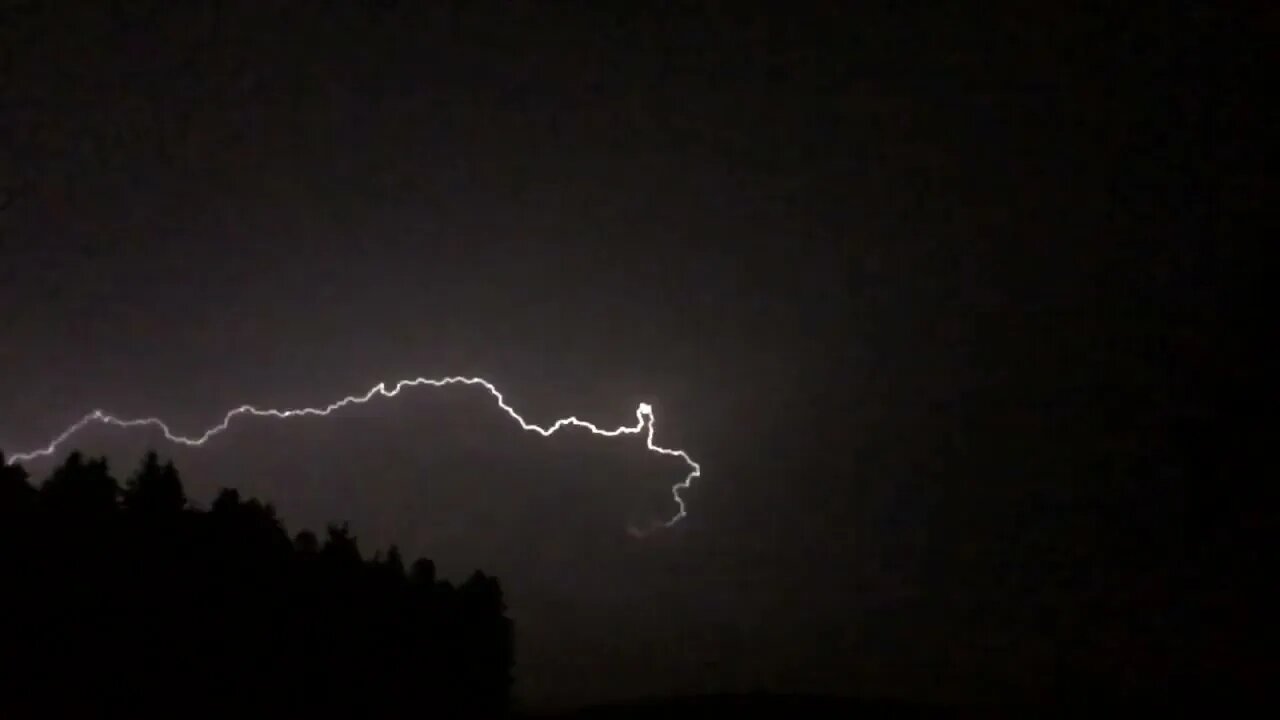 Aftermath of a thunderstorm, light rain and drips, distant rumbles of thunder