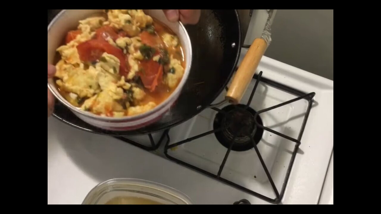 The tomatoes fried with scrambled eggs 木须柿子