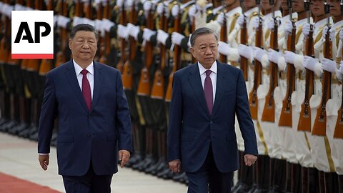 Vietnam's new leader meets China's Xi Jinping in Beijing in his first overseas visit