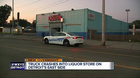 Truck crashes into liquor store on Detroit's east side