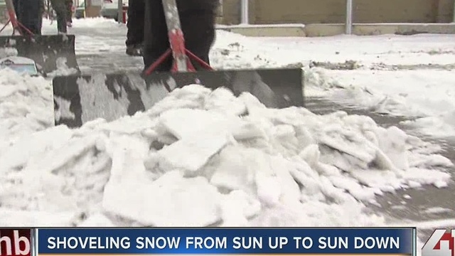 Shoveling snow from sun up to sun down