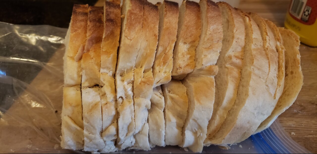 Making bread with no power tools, no power mixers and with a make shift rolling pin.