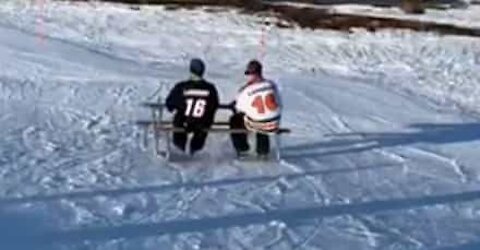 Lazy guys use picnic table to ski