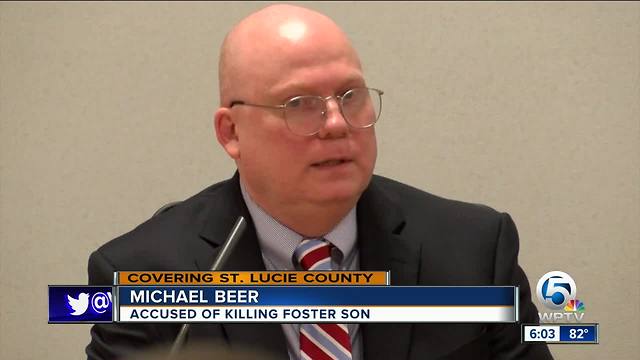 Man charged with killing foster son takes stand