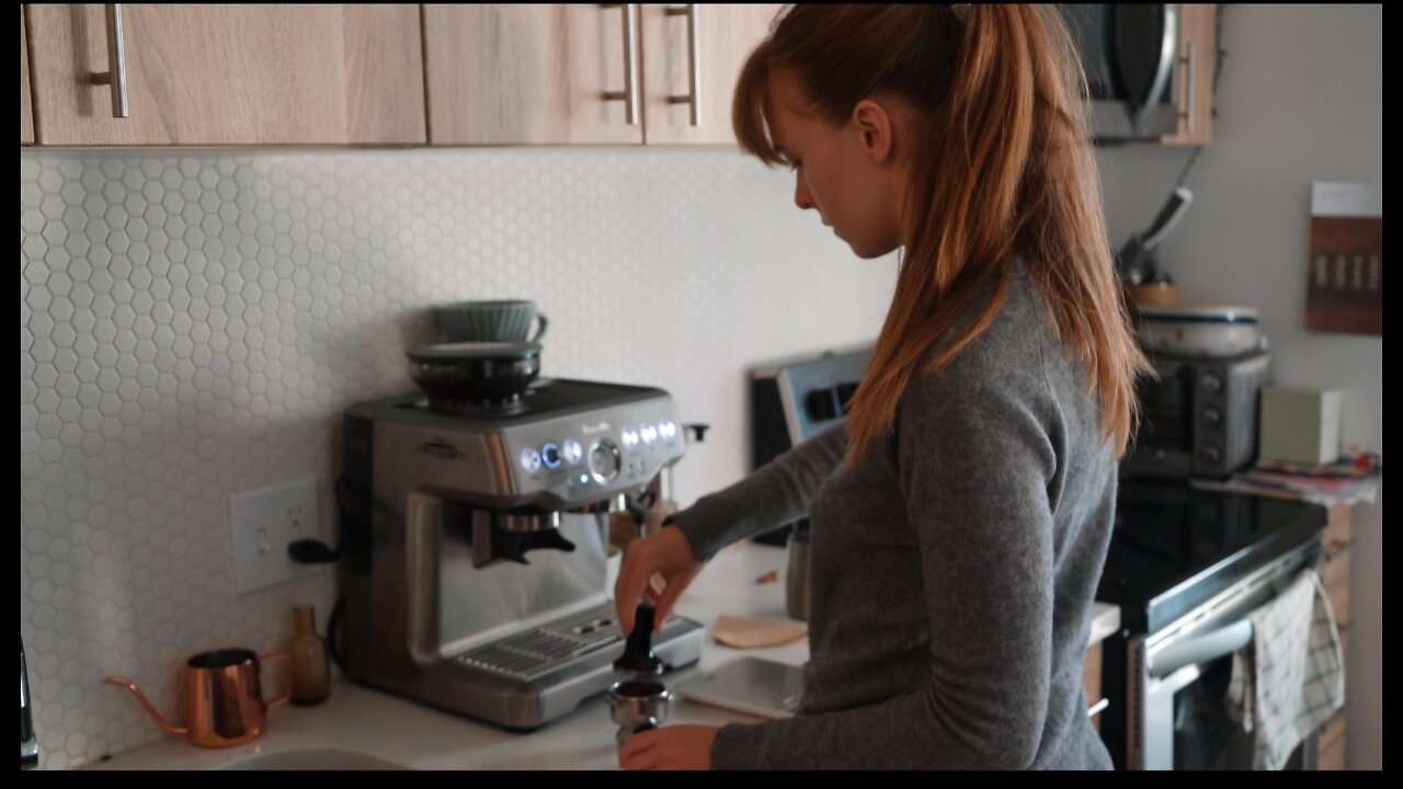 Girl makes breakfast coffee