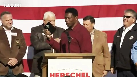 Herschel Walker Packs Stage with Sheriffs to Show Off Fake Police Badge