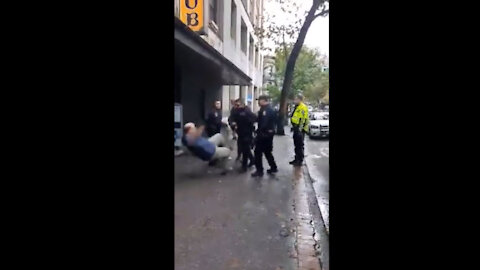 Vancouver Police shove man to ground then immediately go after the person recording it