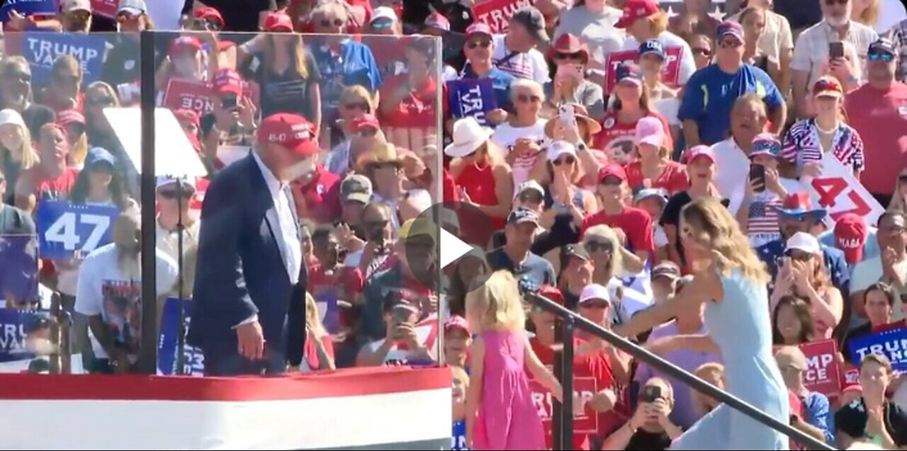 WHOLESOME: President Trump picks up his granddaughter Carolina on stage...