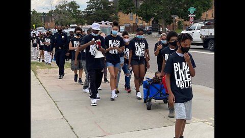 Dozens rally for end to Black on Black youth violence, call for more 'tough love' from parents