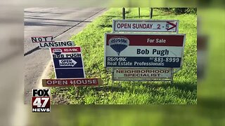 Local realtor defends controversial signs