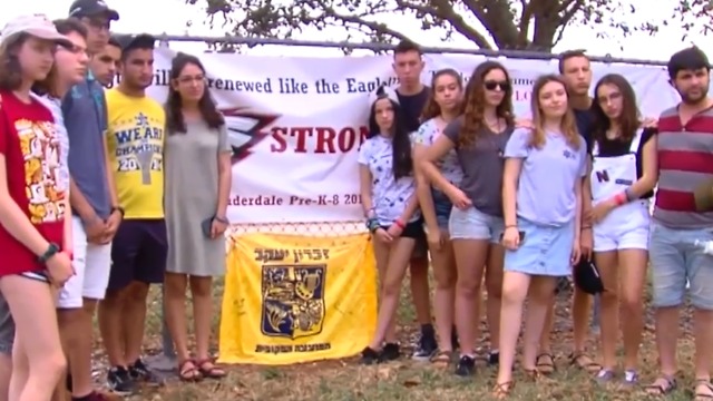 Global support pours in for school shooting victims