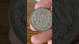 A Silver Mexican Peso Coin Overly Excited Overview