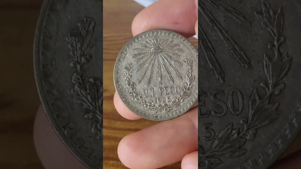 A Silver Mexican Peso Coin Overly Excited Overview