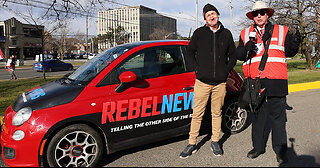 Holy Hot Wheels! A Rebel News super-fan covers his car with Rebel logos & slogans!