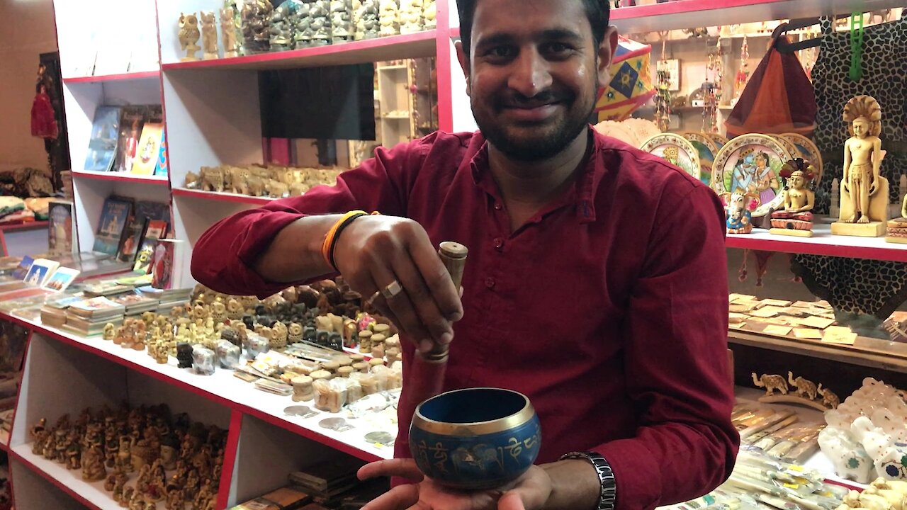 Mysterious singing bowl demonstrated by shop owner in India