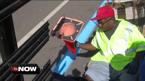 Meet the crew behind the mysterious Akron Marathon's blue line