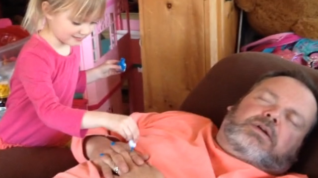 Cute Girl Puts Nail Polish On Her Dad’s Fingers