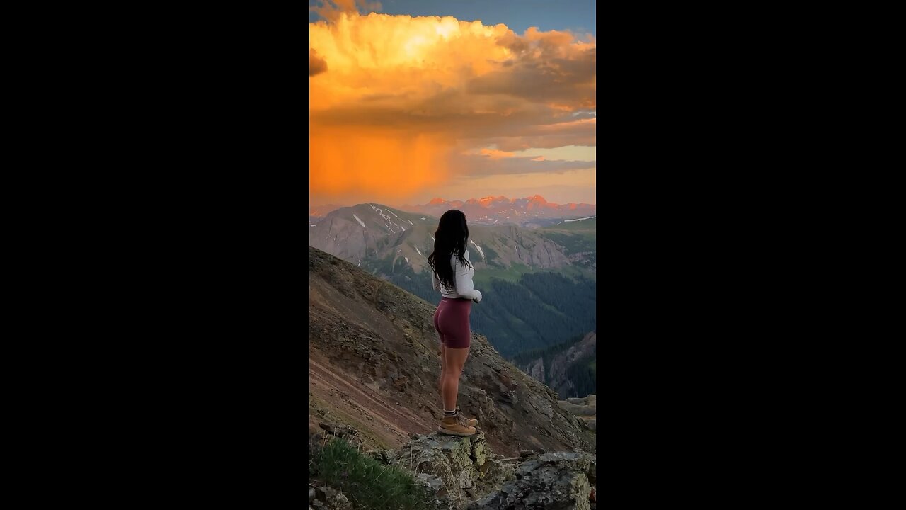 When rain clouds light up🤯 #sunset #colorado #sanjuanmountains