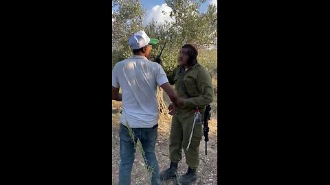 “I will kill you,& this land is mine.”An armed Israeli settler in IDF uniform threatens Palestinians