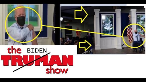 The Truman Show. Biden on a fake white house stage with fake scenery in the windows. PUPPET