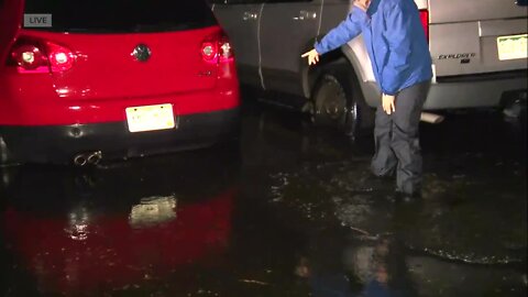 East Denver apartment complex parking lot floods Friday