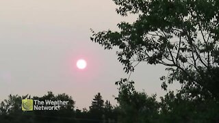 Smoky skies spreads across the prairies turning sunrises red