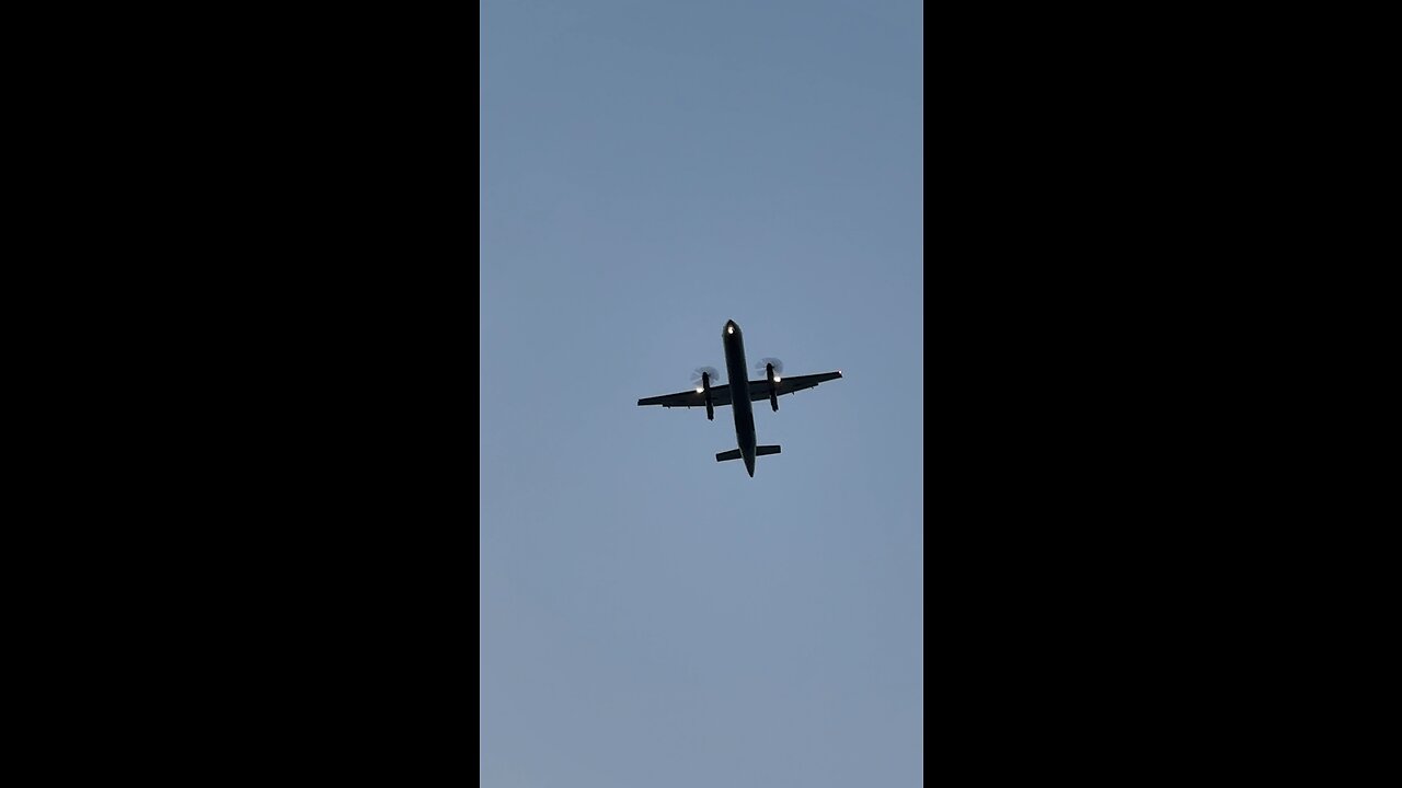 Turboprop propeller plane low flying