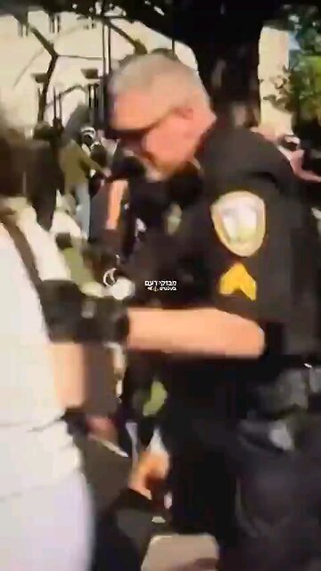 Far left professor resists arrest at protest, gets slammed to the ground.