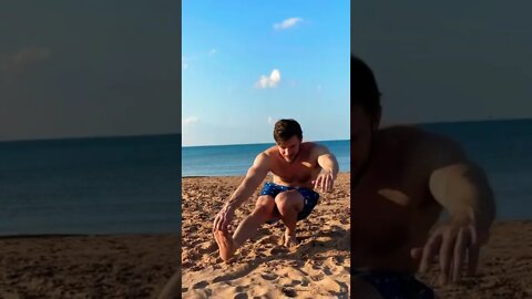 Nailing a pistol squat at the beach