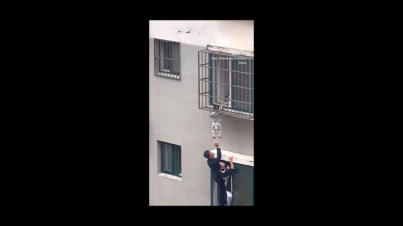 Neighbours rescue boy dangling from 4th-floor window in China #ytshorts