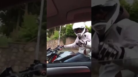 Bike Rider Arguing With Car Driver Gets Nasty Suprise