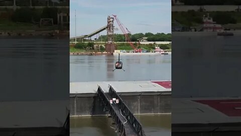 Helicopter take off, at the St. Louis Arch with a shot of Eads bridge