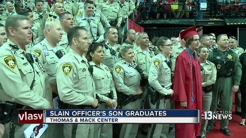 Slain Metro officer's son graduates high school with support of department