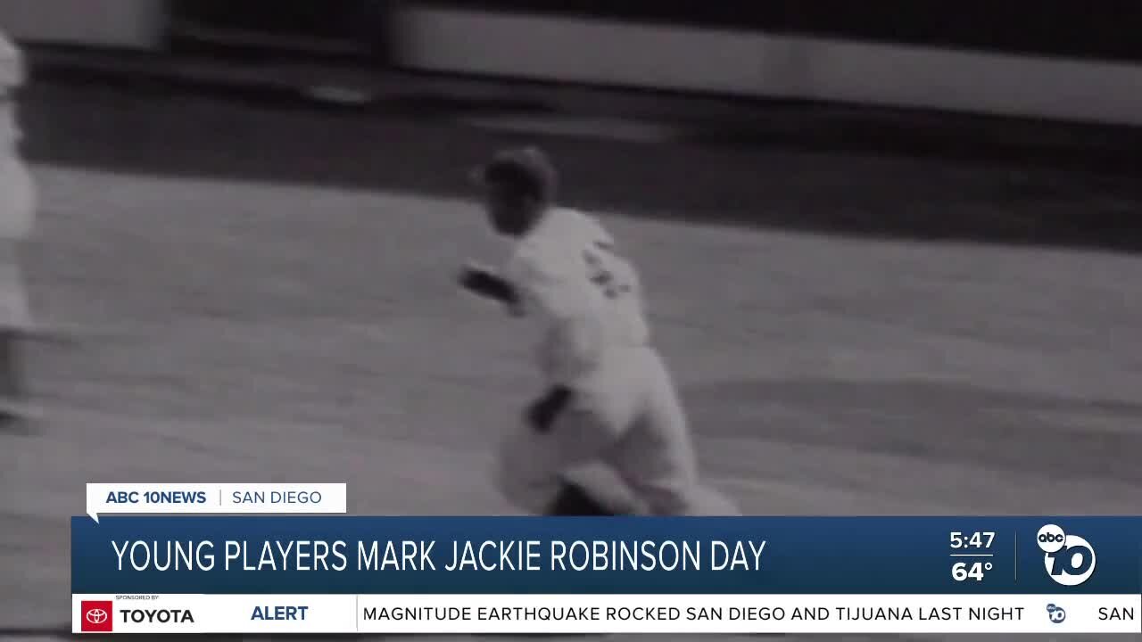 Young baseball players celebrate Jackie Robinson Day