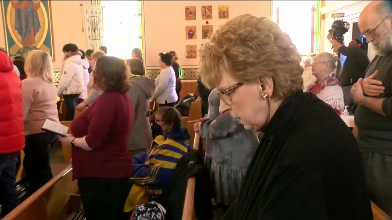 Song, prayers offer comfort to Ukrainians fearful for family back home