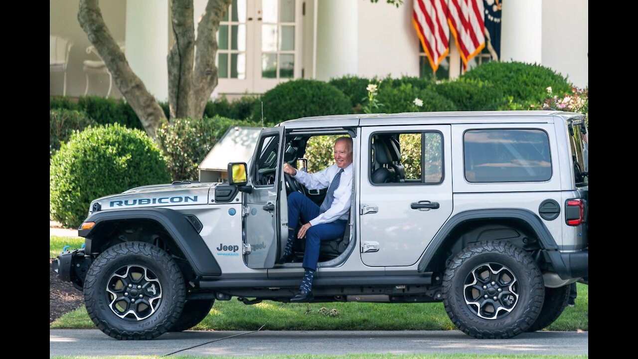 President Biden Drives an Electric Jeep Wrangler on the White House South Lawn