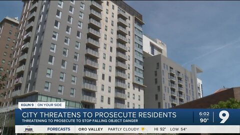 City threatens prosecution for dropping items off highrise