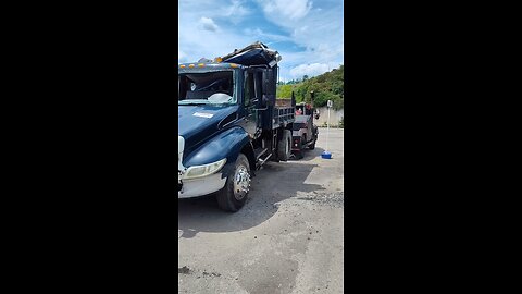 wrecked international dump truck