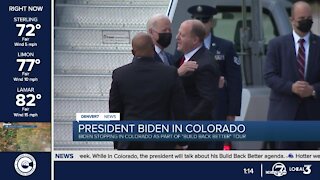 President Biden arrives in Colorado, greeted by Polis and Hancock