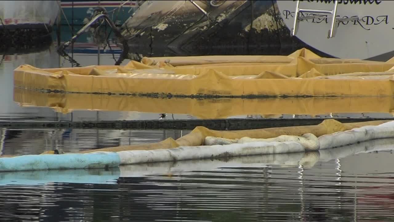 Crews contain pollution at Marina that caught fire