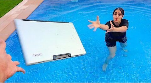Angry Brother Throws Sisters Laptop In Pool