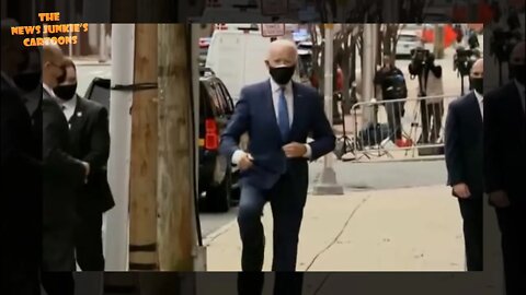 Biden walking with an orthopedic boot.