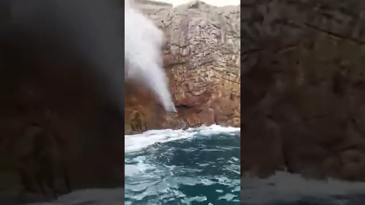 Waves erupting out of rocks, like a geyser Nivati Rocks in Maharashtra's Sindhudurg district, India