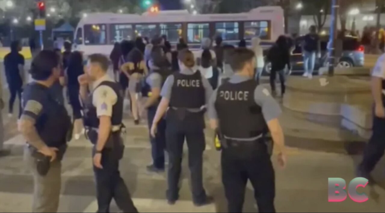 Hundreds of teens flood Chicago, smashing car windows, firing shots