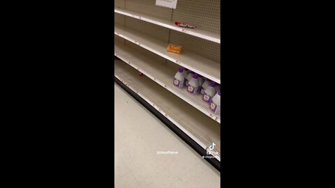 Two women fight over the last of the baby formula on the shelves at a Target in Massachusetts