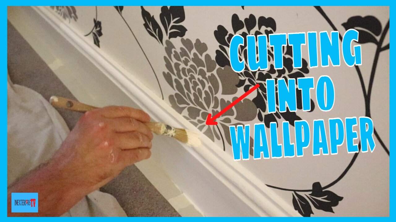 Cutting in paint to wallaper. Cutting in.